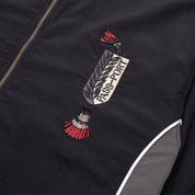 Pass~Port Tassle RPET Delivery Jacket - Black / Grey